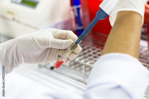 Scientists are doing laboratory experiments.