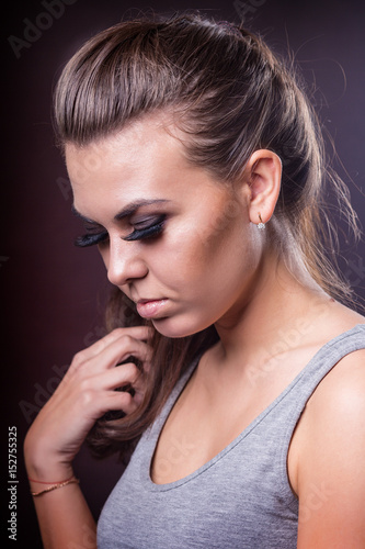 Young beautiful woman with make-up and manicure
