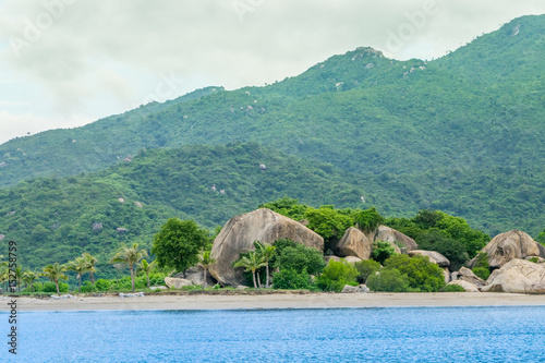 Stone sea shore at a paradise island -the South China sea - Vietnam Nha Trang bay
