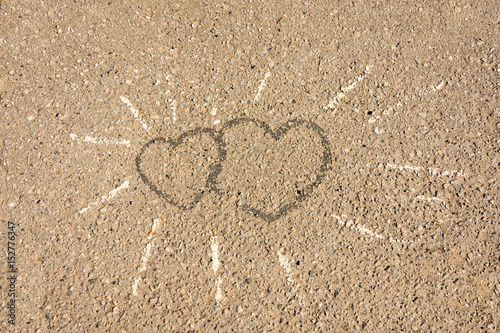 Heart painted on asphalt