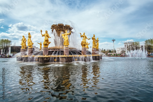 Fountain of friendship of the people daily view at VDNH city park exhibition with blue sky and clouds in Moscow, Russia outdoor landscape.