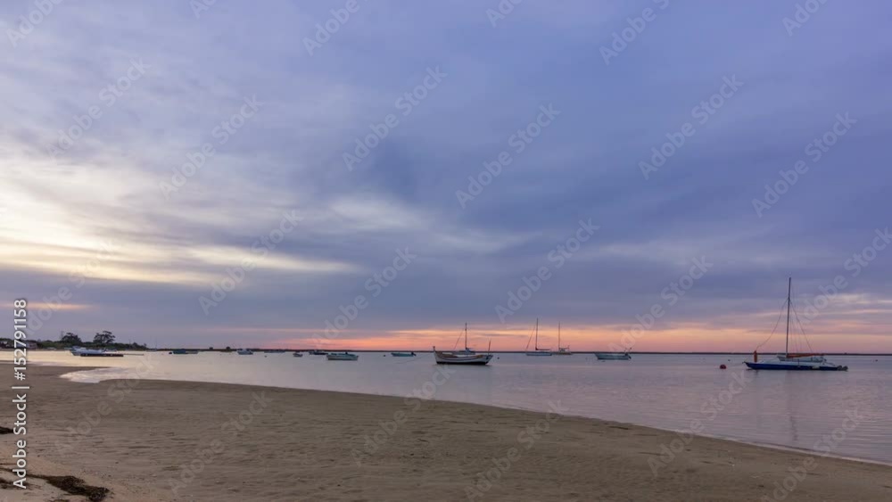 Timelapse Algarve Cavacos beach dawn landscape at Ria Formosa wetlands reserve, southern Portugal. Timelapse Algarve Cavacos beach dawn landscape at Ria Formosa wetlands reserve, southern Portugal.
