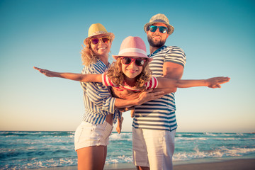 Happy family having fun on summer vacation