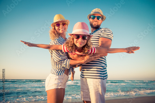 Happy family having fun on summer vacation