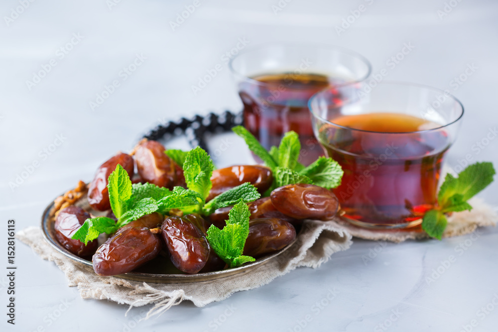 Ramadan ramazan kareem. Traditional arabic tea with mint and dates Ramadan ramazan kareem. Traditional arabic tea with mint and dates