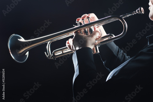 Trumpet player. Trumpeter hands photo