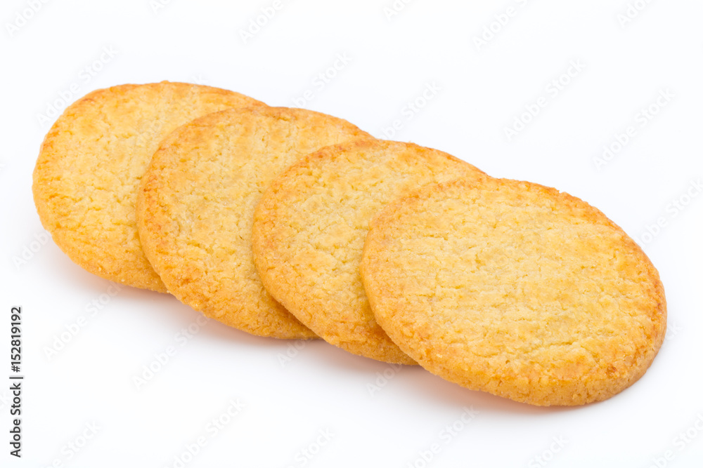 Stacked short pastry cookies isolated on white background.
