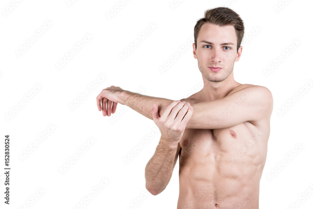 Healthy lifestyle. Portrait of a handsome guy with a sporty naked body, warming up, isolated on white background. Horizontal frame Healthy lifestyle. Portrait of a handsome guy with a sporty naked body, warming up, isolated on white background. Horizontal frame
