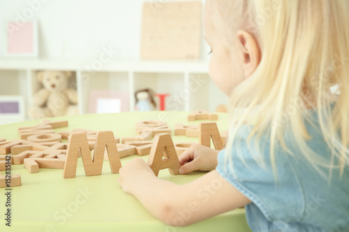 Cute little child playing w...