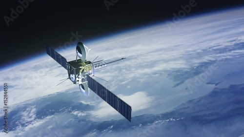 Communications satellite orbiting planet earth, slowly moving up.