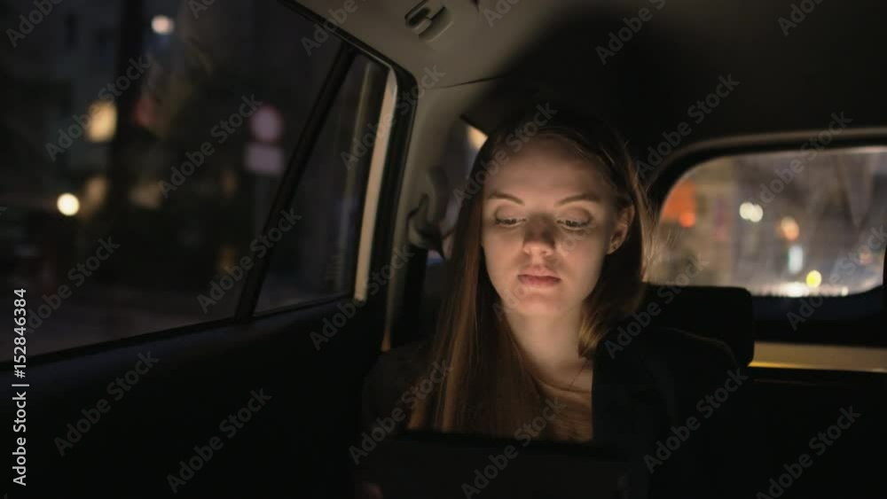 Young Businesswoman Having a Skype Call in the Car Young Businesswoman Having a Skype Call in the Car