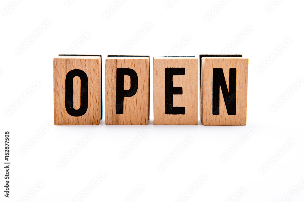 Open - wooden block letter with white background
Open - wooden block letter with white background