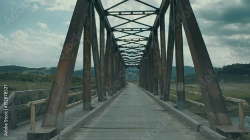 An old steel and wooden bridge in Poland.  photo