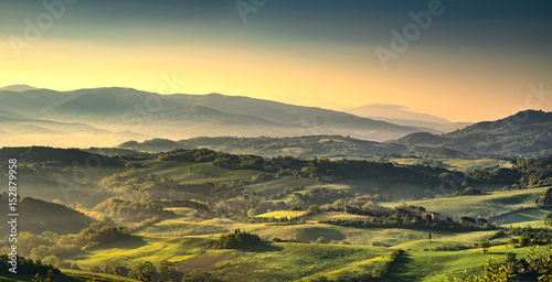 Tuscany Maremma foggy morning, farmlands and green fields. Italy.