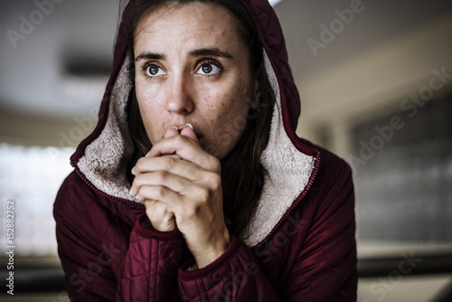 Thoughtful Homeless People Feeling Cold in Winter photo