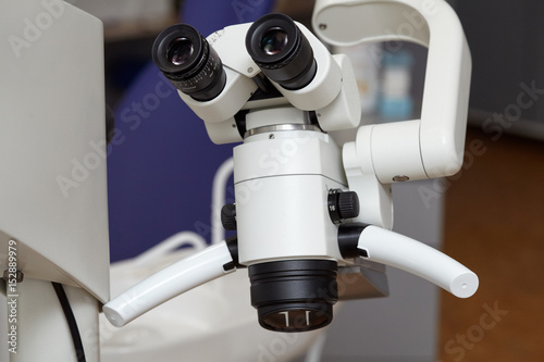 Professional endodontic medical binocular microscope in the dental office