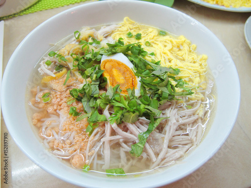 Vietnamese vermicelli with egg, chicken and pork or Bun thang in white bowl