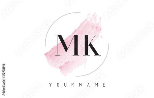 MK M K Watercolor Letter Logo Design with Circular Brush Pattern. photo