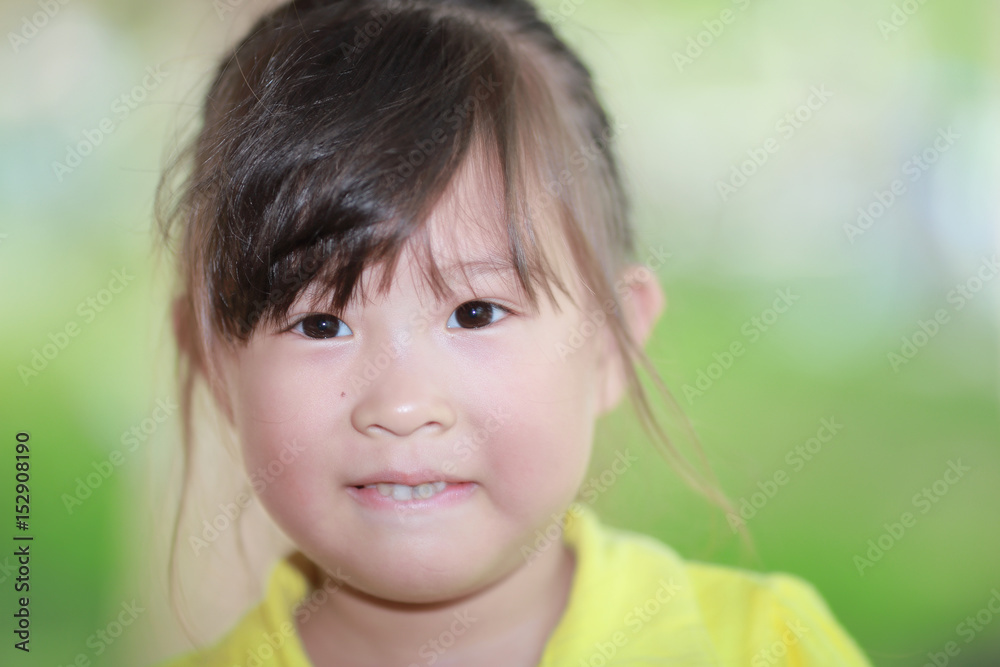 Happy cute little girl outdoors in summer day Happy cute little girl outdoors in summer day