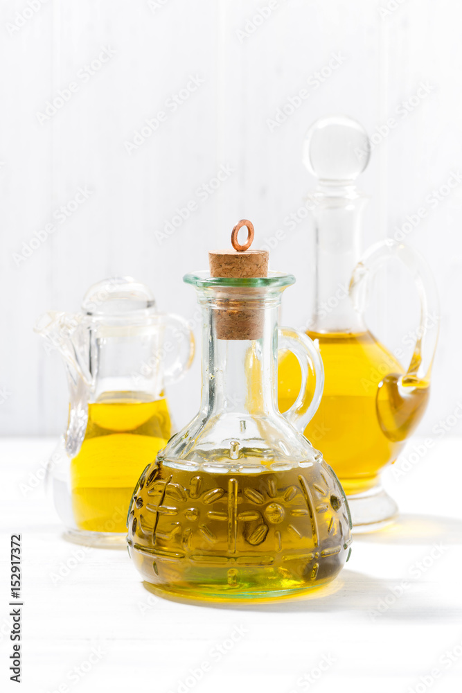 assortment of olive oil, vertical assortment of olive oil, vertical
