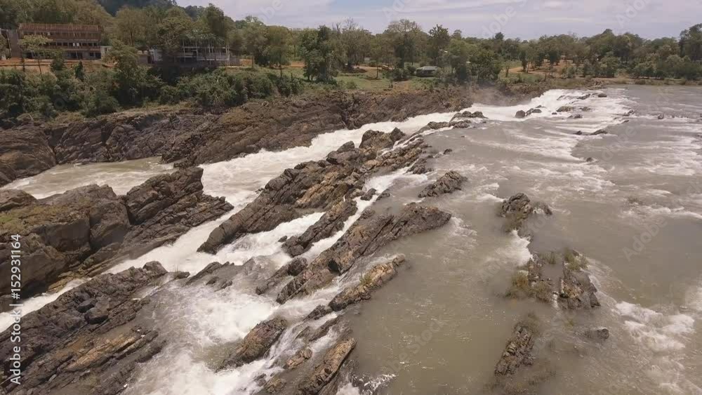 low fly above series of cascading waterfalls and rapids in the Mekong river low fly above series of cascading waterfalls and rapids in the Mekong river