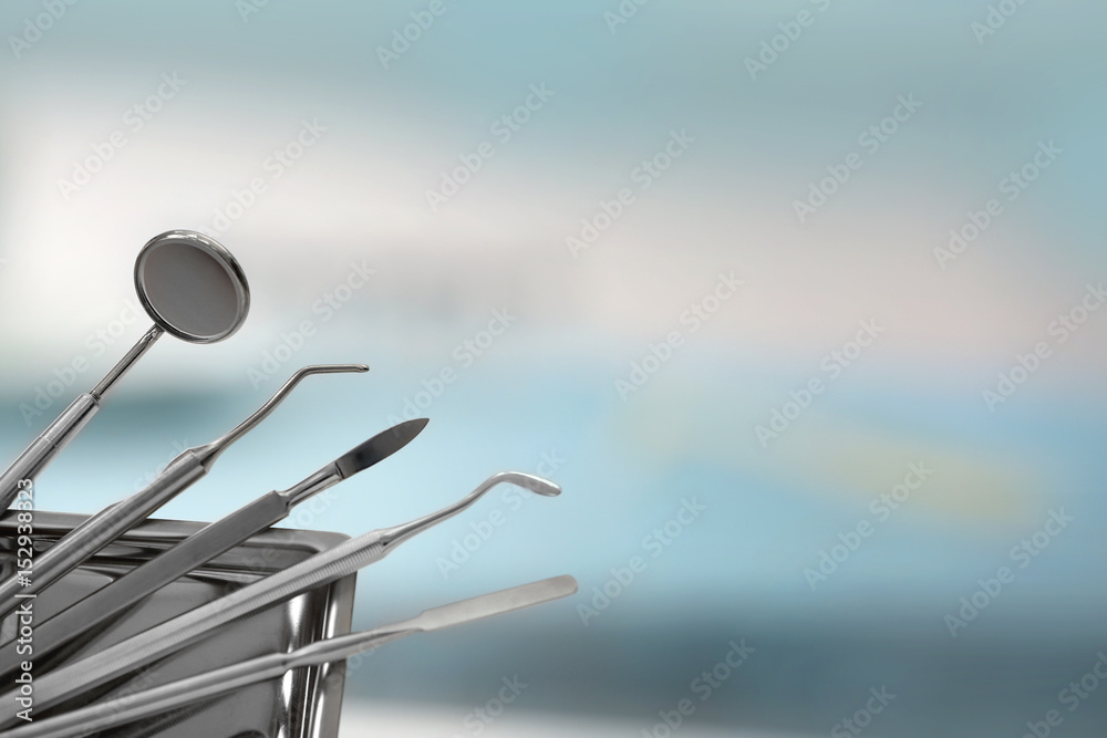 Dental tools on blurred background Dental tools on blurred background