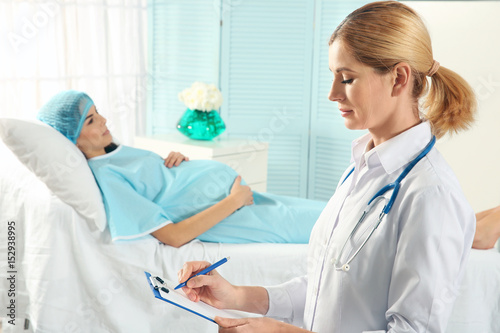 Doctor filling medical reco...