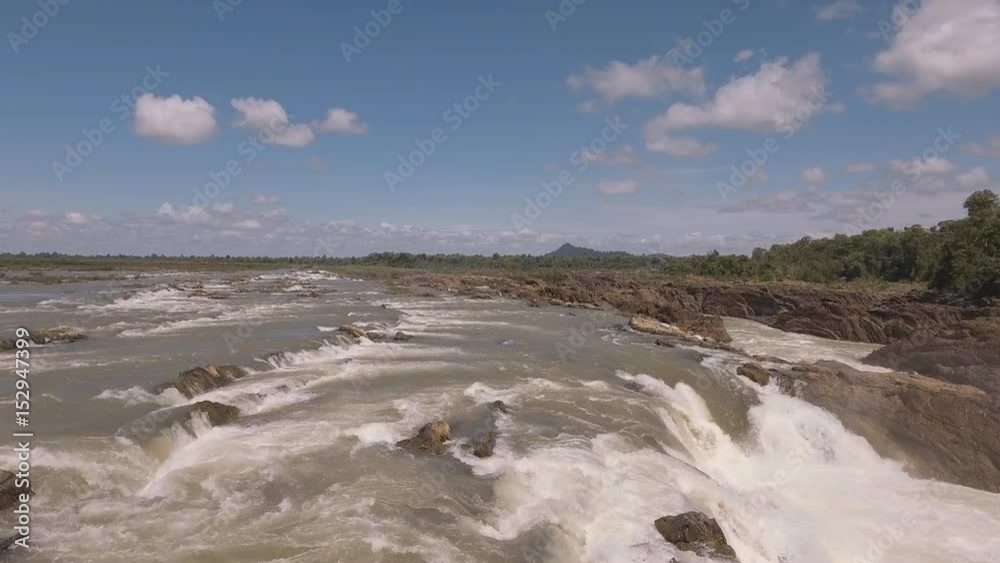 low fly over series of cascading waterfalls and rapids in the Mekong river low fly over series of cascading waterfalls and rapids in the Mekong river