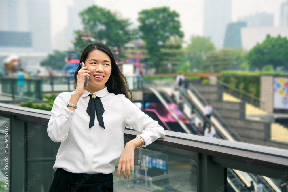 Business woman on the phone in modern environment Business woman on the phone in modern environment