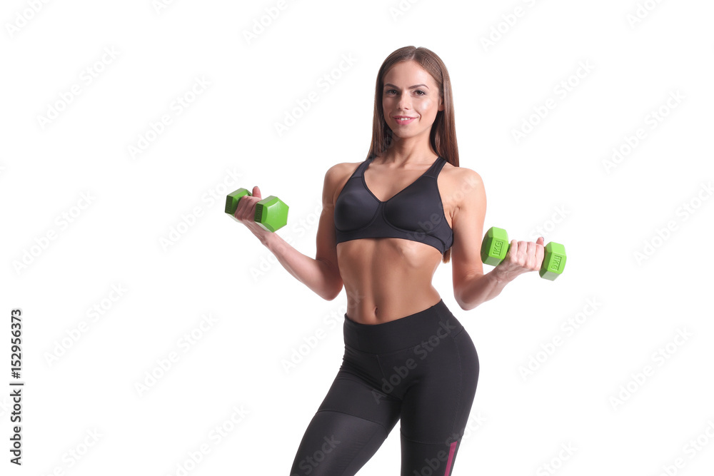 sporty muscular woman working out with dumbbells sporty muscular woman working out with dumbbells