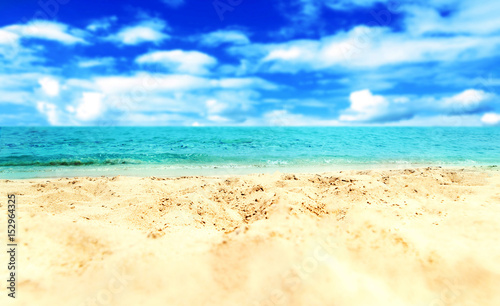 Sand Beach and blue sea - Tropical Holiday Background.