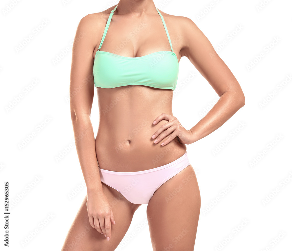 Beautiful young woman in swimsuit on white background Beautiful young woman in swimsuit on white background