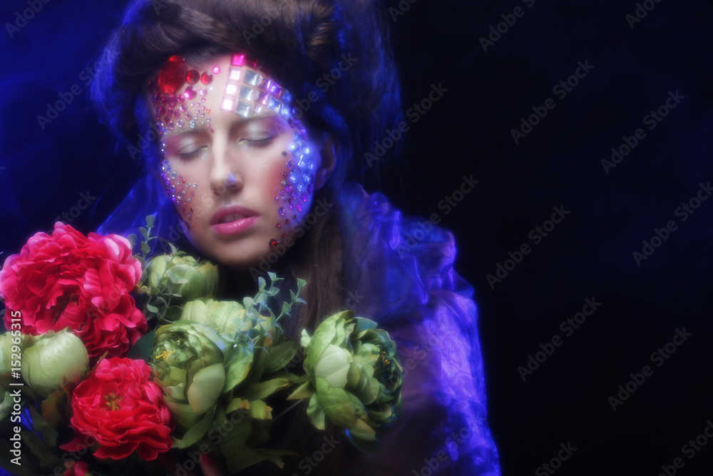 woman in creative image with big flowers. woman in creative image with big flowers.