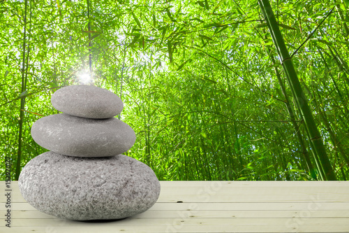 Zen stones on wooden surface