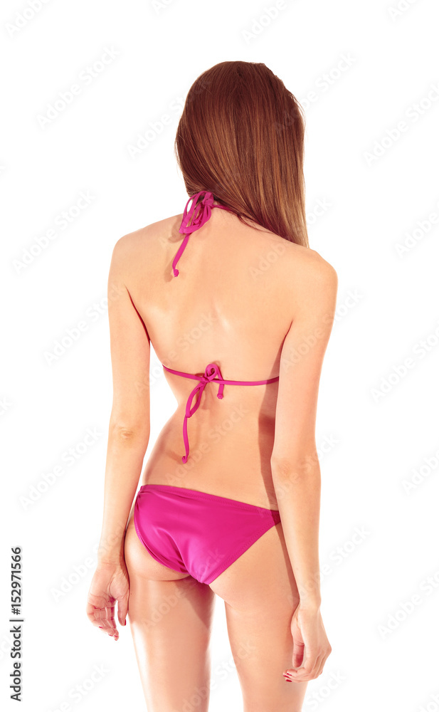 Beautiful young woman in swimsuit on white background