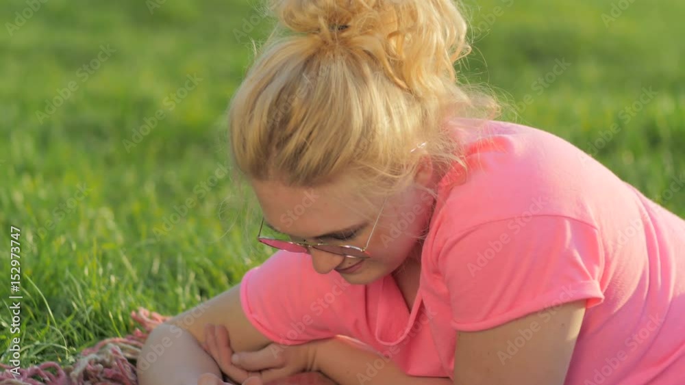 Girl with phone. Warm sunny day Girl with phone. Warm sunny day
