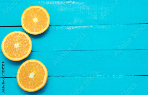 Fresh Oranges On Turquoise Background