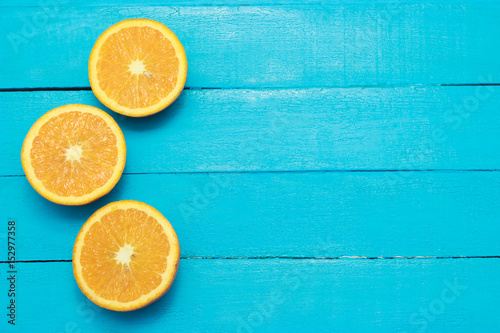 Fresh Oranges On Turquoise Background