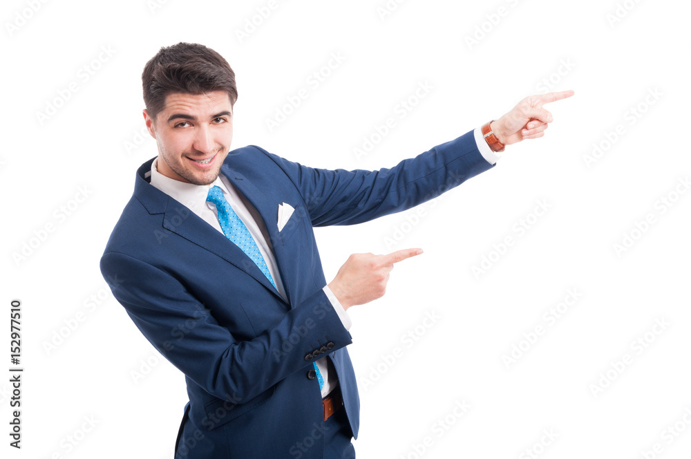 Handsome broker or lawyer pointing something upwards Handsome broker or lawyer pointing something upwards