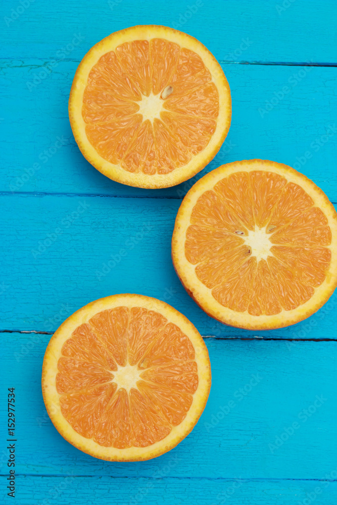 Fresh Oranges On Turquoise Background Fresh Oranges On Turquoise Background