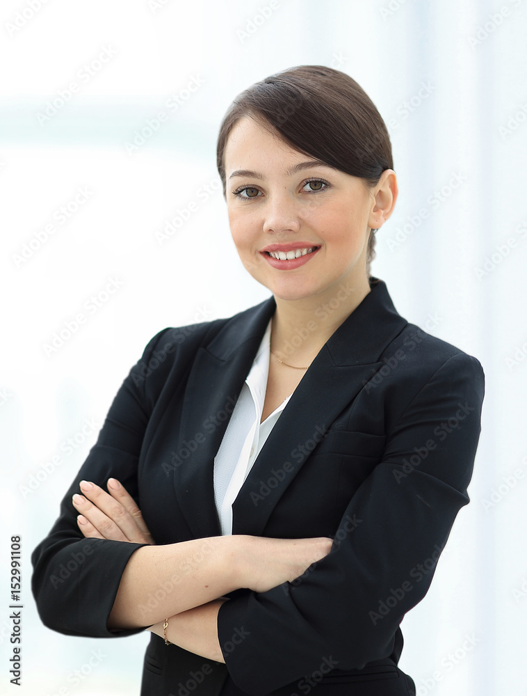 Positive business woman smiling over white background Positive business woman smiling over white background