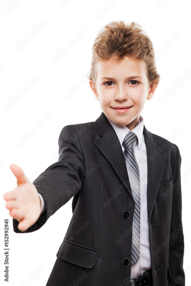 Smiling child boy in business suit gesturing hand greeting or meeting handshake Smiling child boy in business suit gesturing hand greeting or meeting handshake