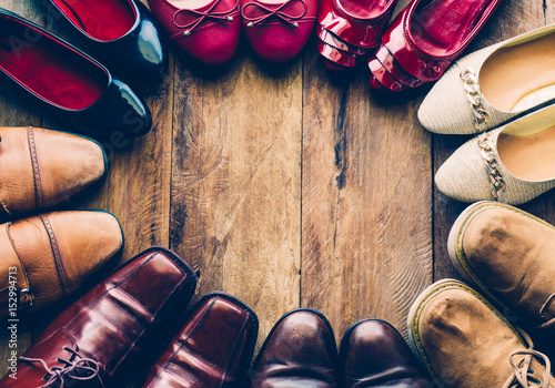 shoes with men and women various styles on a wooden floor - lifestyles.