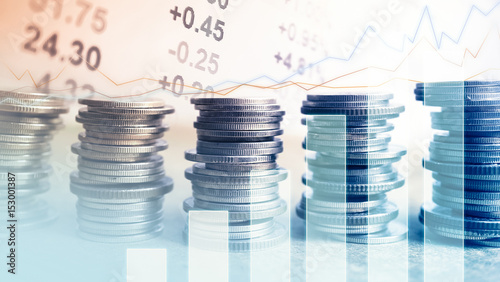 Double exposure of stock display and money for finance and business concept