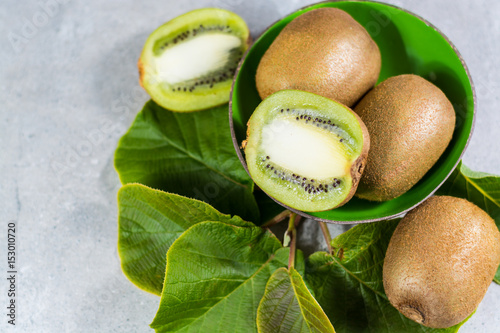 Tropical ripe organic kiwi fruit with leaves ready to eat