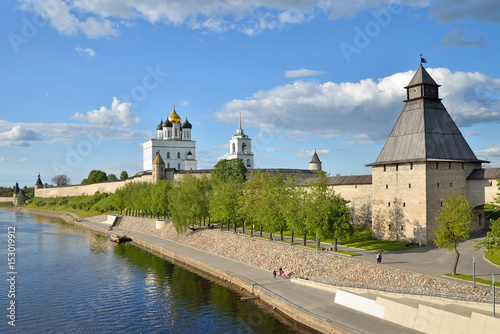 View of Trinity Cathedral, fortress tower with Olginsky bridge over the river Great