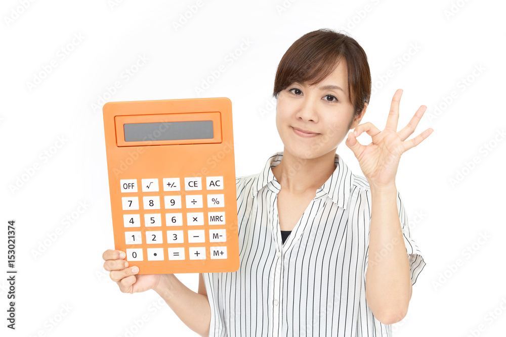 計算機を持つ笑顔の女性 計算機を持つ笑顔の女性