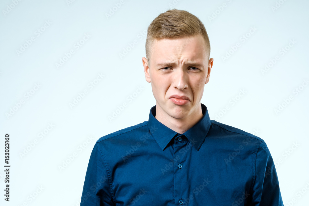 Sad upset young man isolated Sad upset young man isolated