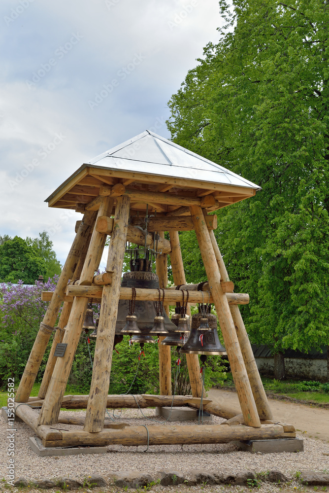 A wooden belfry with bells, Uspensky Svyatogorsky monastery, Pushkinskaya Street A wooden belfry with bells, Uspensky Svyatogorsky monastery, Pushkinskaya Street