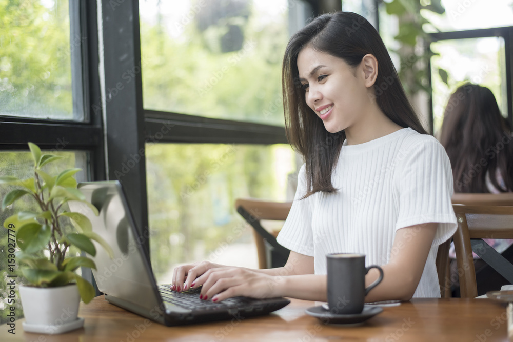© tonefotografia - Beautiful business girl working with tablet , smartphone and drinking coffee in coffee shop © tonefotografia - Beautiful business girl working with tablet , smartphone and drinking coffee in coffee shop